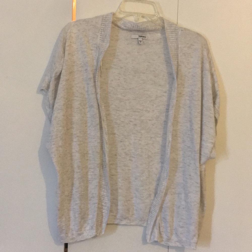 2 cover ups. 1  black,1 light gray with “dashes”.